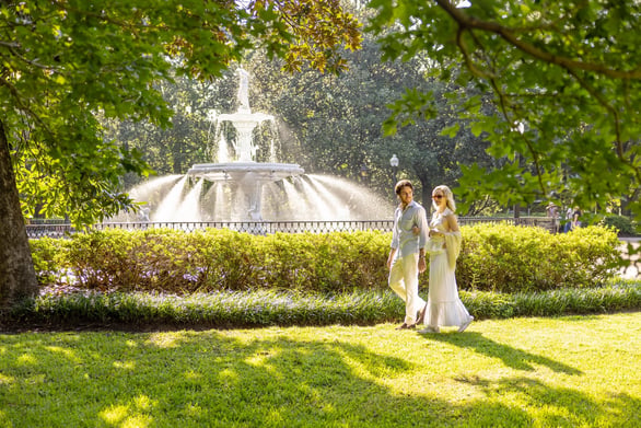 Young couple walking in Forsyth Park